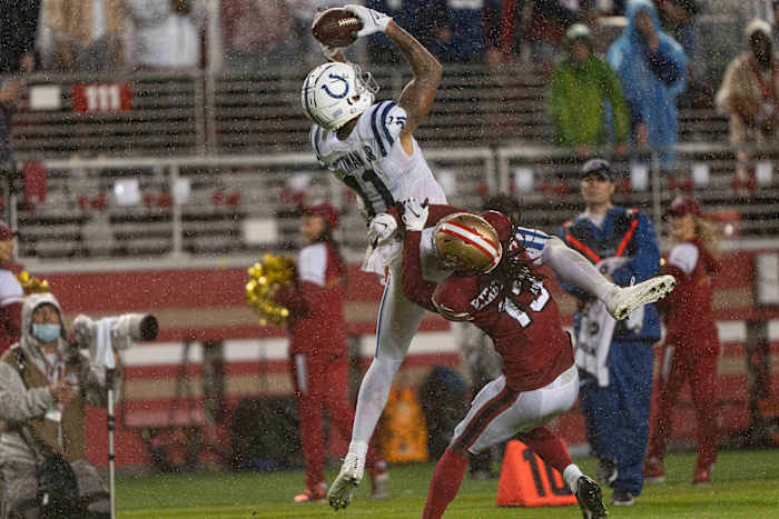 Oct 24, 2021; Santa Clara, California, USA; San Francisco 49ers cornerback Dre Kirkpatrick (13) attempts to defend against Indianapolis Colts wide receiver Michael Pittman (11) during the fourth quarter at Levi's Stadium. Mandatory Credit: Stan Szeto-USA TODAY Sports